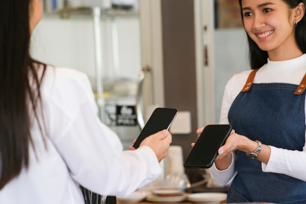 Customer collecting loyalty points with the Offerwhere Business app